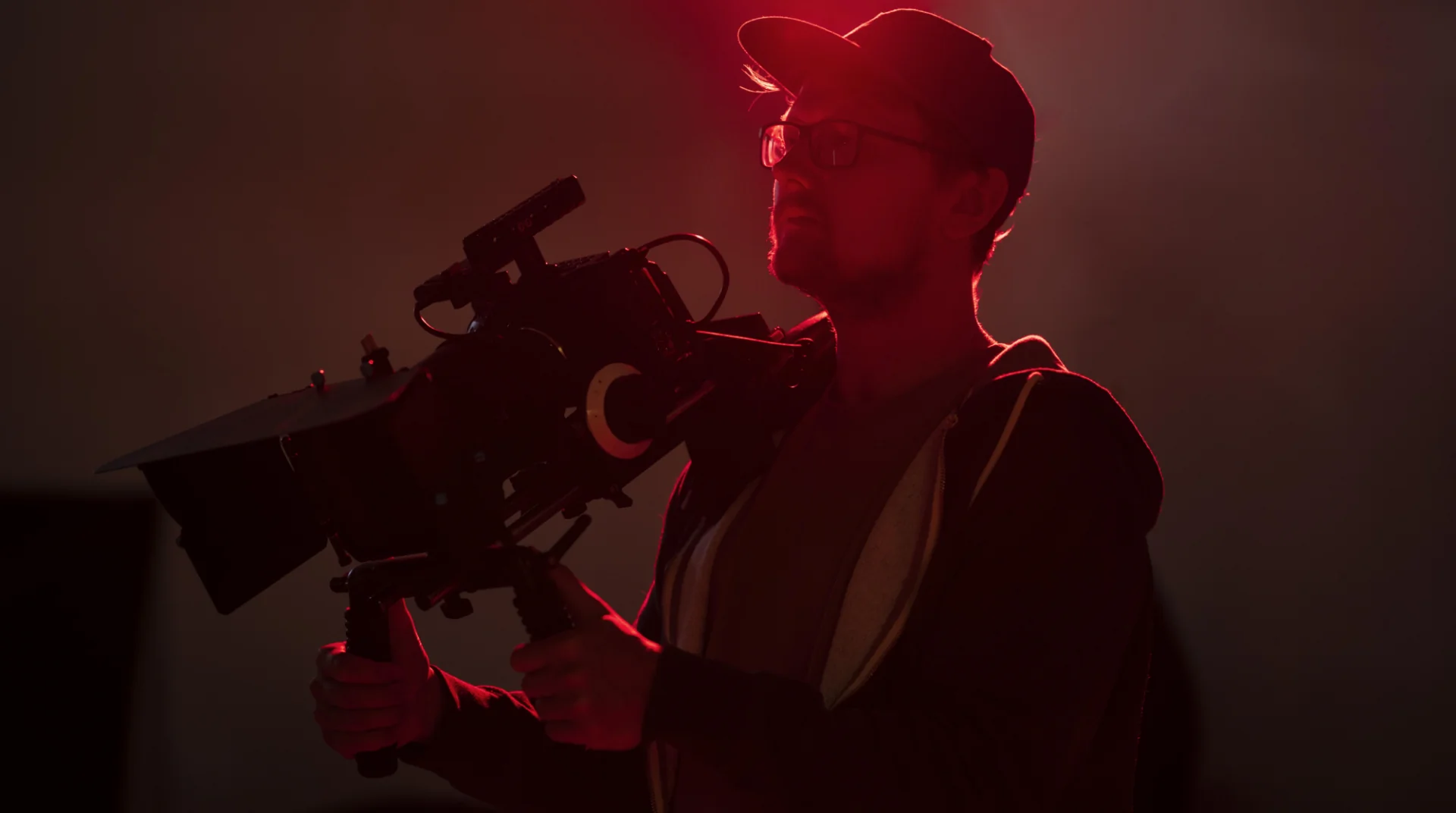 Man filming with professional camera
