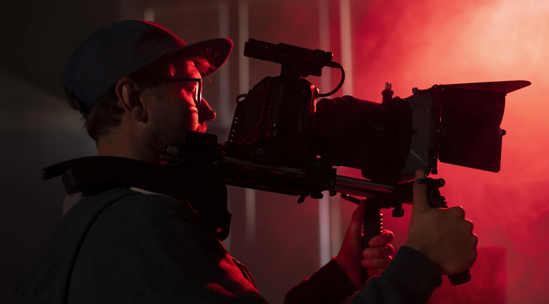 Man filming with professional camera